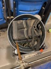 Tote contains a tool bag, sillcock, and other misc items