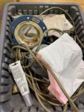 Tote contains silicone, flange, extension cord and other various items