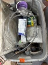 Tote with fan belt, can of stain, clear tubing, PVC fitting, trailer lock and much more