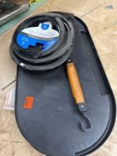 Grill brush, stove drip pans and a unknown item