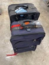 2 roll around suitcases