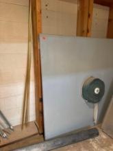 Bathroom stall wall with toilet paper holder