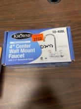 Center wall mount faucet