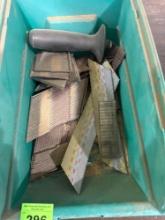 Adhesive cloth roll and nail gun nails
