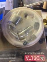 Delta spray assembly
