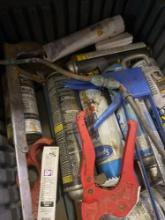 Hacksaw, pipe cutters, caulking, gun, miscellaneous sprays