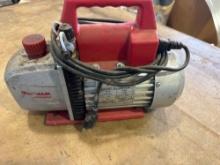 Two stage vacuum pump