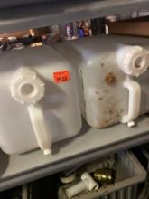 Two 5 gallon water jugs