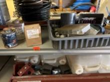 Contents on shelf, blue, monster, pipe, thread sealant, PVC cement, box of blue hex, head, concrete