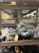 Contents of shelf Which include bend all nut knuckle savers, pull down diverter tub spout and