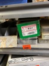 Items on shelf cotter pins, nuts, bolts, screws and other items