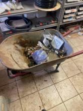 Wheel barrel with miscellaneous items inside