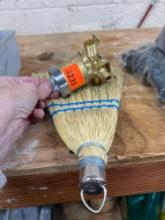 Delta tub and shower valve and a whisk broom