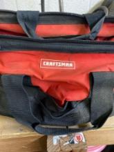 Craftsman tool bag with various items
