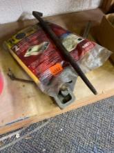 Prybar, Shop vac bag, and other item