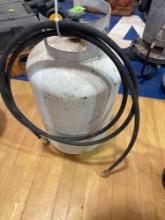 Propane tank with hose