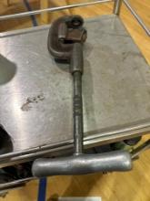 Ridged black pipe cutter