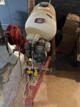 Skid sprayer with Honda GC 160 gas engine 55 gal tank two spray nozzle on back with hosereel on