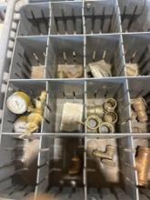 Organization tote with misc brass fittings and gas regulator