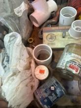 Tote with PVC fittings, PVC cement, and other misc items