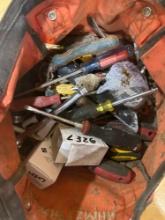 Tool bag with various screw drivers and other tools