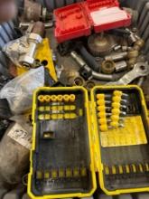 Tote with drill bits, brass fittings, and other various misc items