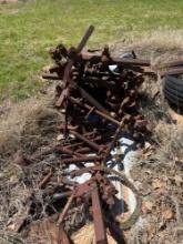Vintage plow pieces or scrap metal must bring help to load