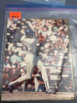 Sign photo of Erik moles and sign photo of Texas Rangers player Gonzalez and I holiday greetings