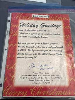 Sign photo of Erik moles and sign photo of Texas Rangers player Gonzalez and I holiday greetings