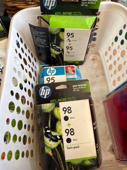 HP printer cartridges and a Colorado Rockies hat