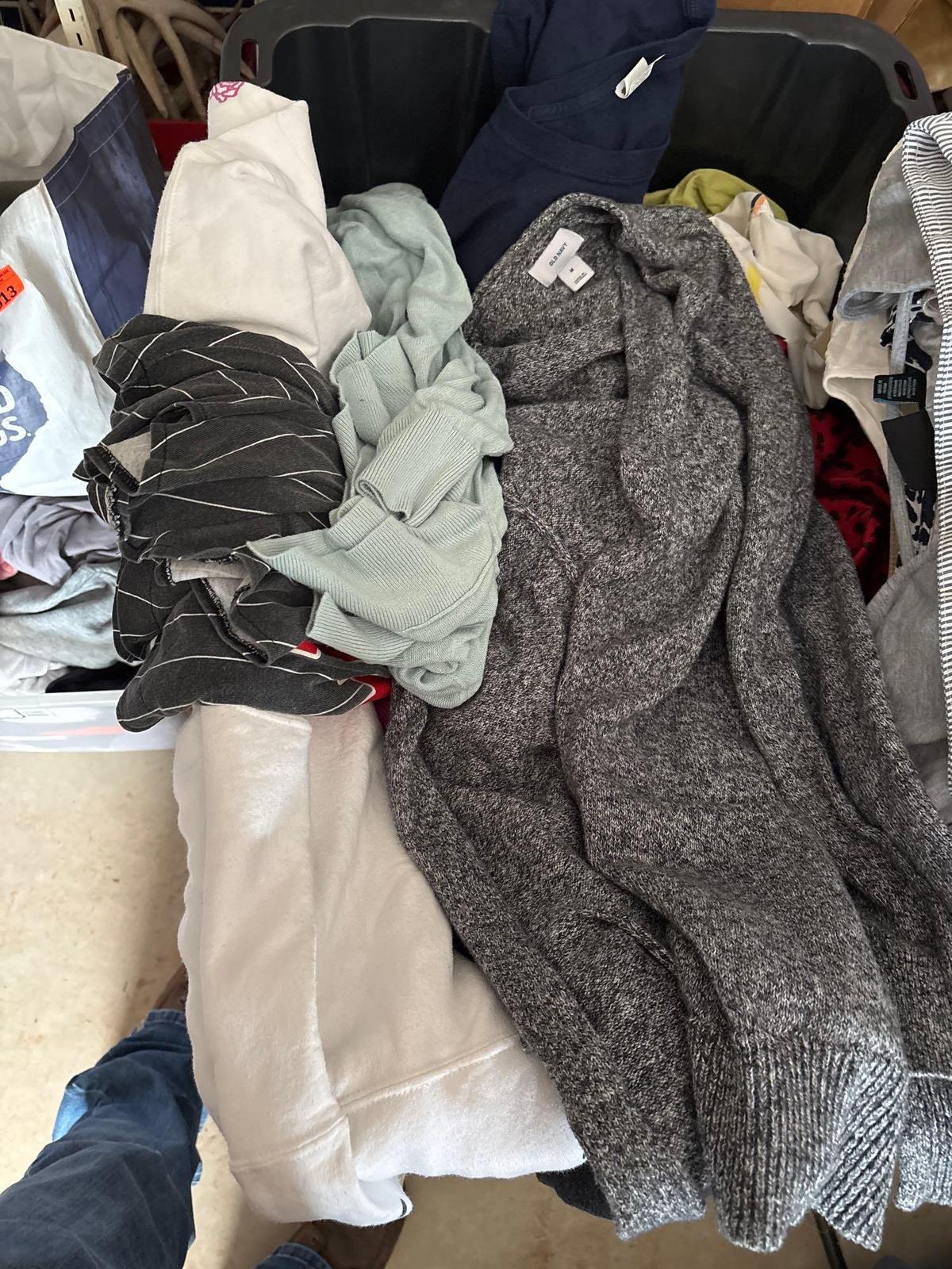 Assorted women clothes and various sizes in a tote