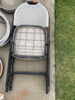 2 plastic folding chairs