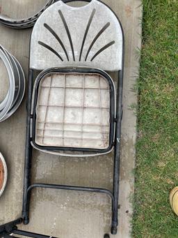 2 plastic folding chairs