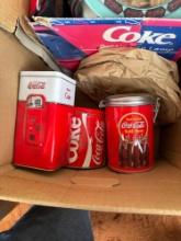 Box of Coca Cola collectible items
