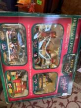 The Holiday express electric train set animated Santa and elves, synchronized voice and train sounds