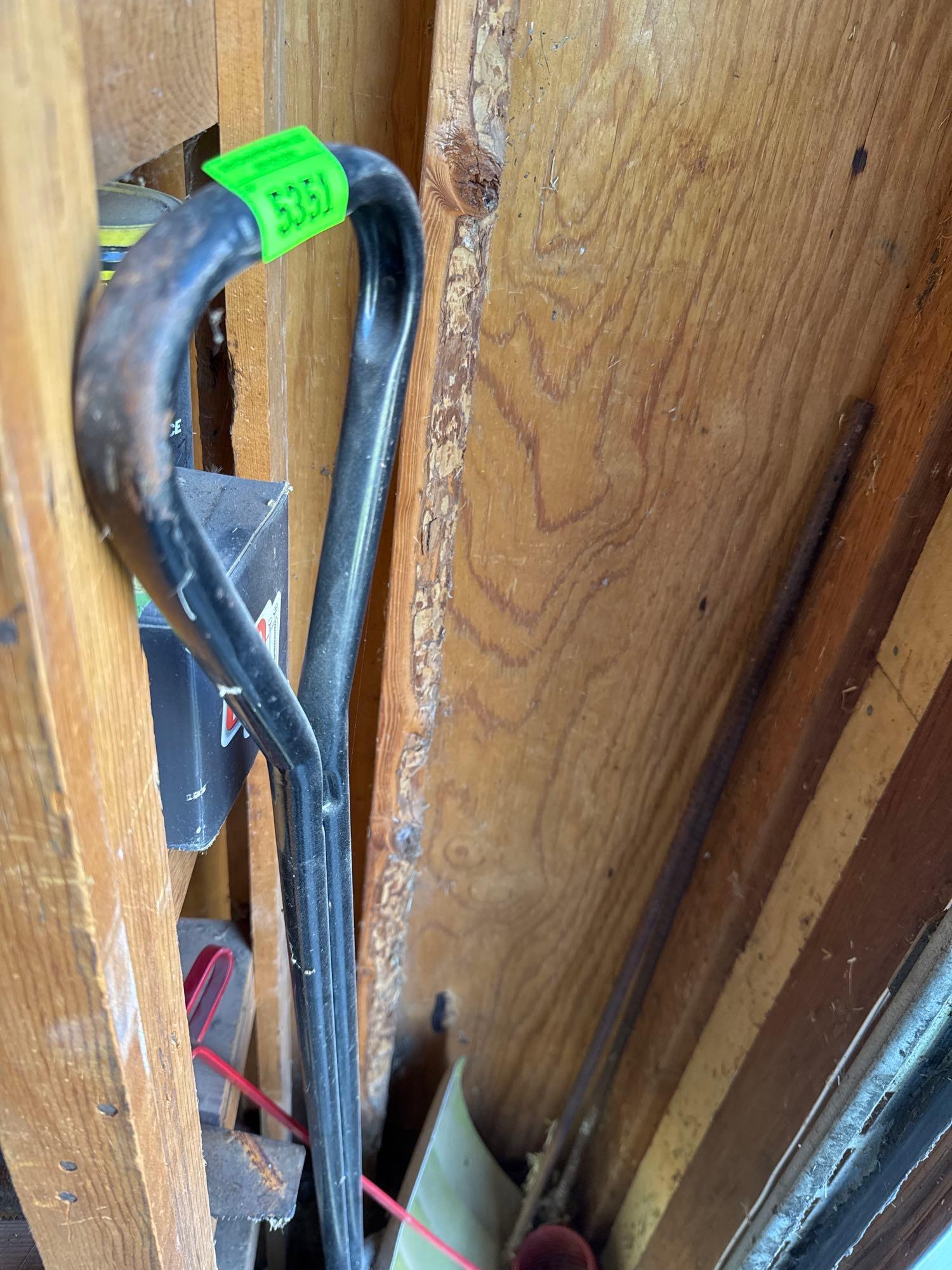 Snow shovel, pecan picker, and rebar