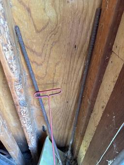 Snow shovel, pecan picker, and rebar