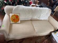 Couch, there is a hole in the fabric on the back of the couch