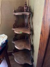 Four SS held corner unit 48 inches tall x 16 inches deep living room
