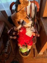 Child's rocking chair, doll , stuff animals, dishes