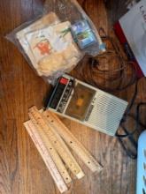 Cassette player, extension cord, rulers, mini sewing kit, and more
