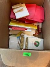 Box of envelopes, cards, and invitations