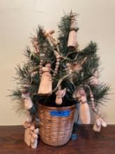 2 ft Christmas tree in woven basket with wood angel ornaments