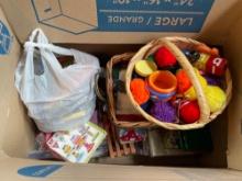 Box with woven baskets, disposable napkins, cloth napkins, various hot plates or pot holders, some