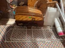 Wicker serving trays, metal shelf, wrapping paper, cups and more