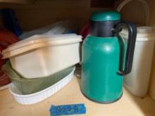 everything on top shelf, dishes, Bundt pans, baking pans, platters and more