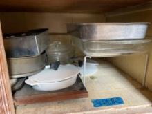 everything on bottom shelf, casserole dishes, serving trays, baking dishes, and more