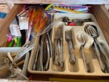 contents in drawer, silverware and organizing tray, plastic straws and more