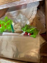 Contents in drawer, paper doilies, shrink wrap and more