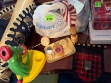 Bag of different items including mirror, microscope, doll grooming set and more